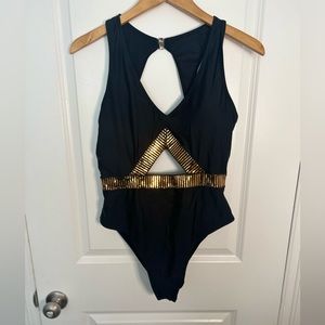 Black bathing suit, gold detail